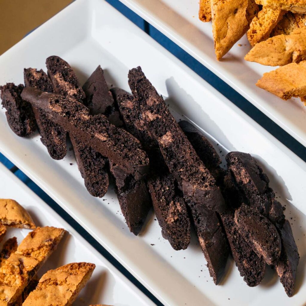 Double Chocolate Biscotti stacked on a plate, ready to be gifted for the holidays