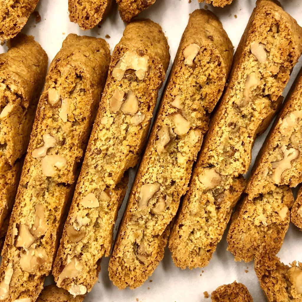 Gluten free pumpkin spice biscotti with warm spices baked into a crisp golden cookie.
