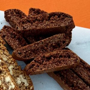 Close-up of Chocolate Anise Biscottini with visible anise seeds and crisp texture.