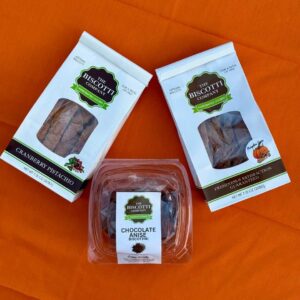 Sicilian Fall Biscotti Bundle with Chocolate Anise, Pumpkin Spice, and Cranberry Pistachio Biscotti in full-size packages.