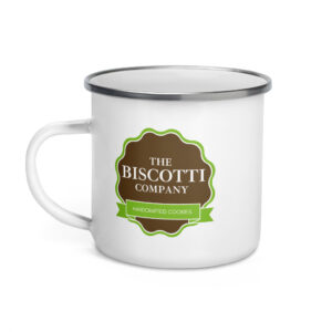 White ceramic mug displaying The Biscotti Company logo with a green ribbon reading Handcrafted Cookies.