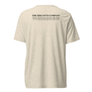 Back of a beige T-shirt with black text: 'THE BISCOTTI COMPANY' and notes about a 200-year Sicilian recipe.