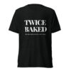 Back view of a black T-shirt with large white 'TWICE BAKED' text on the lower back area