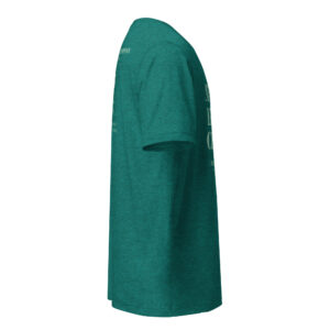Side view of a teal shirt on a dress form, with partial white text along the seam.