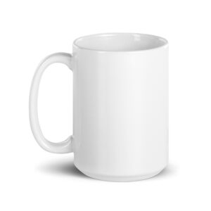 Close-up of a white ceramic mug, showing its handle and rim against a white backdrop.