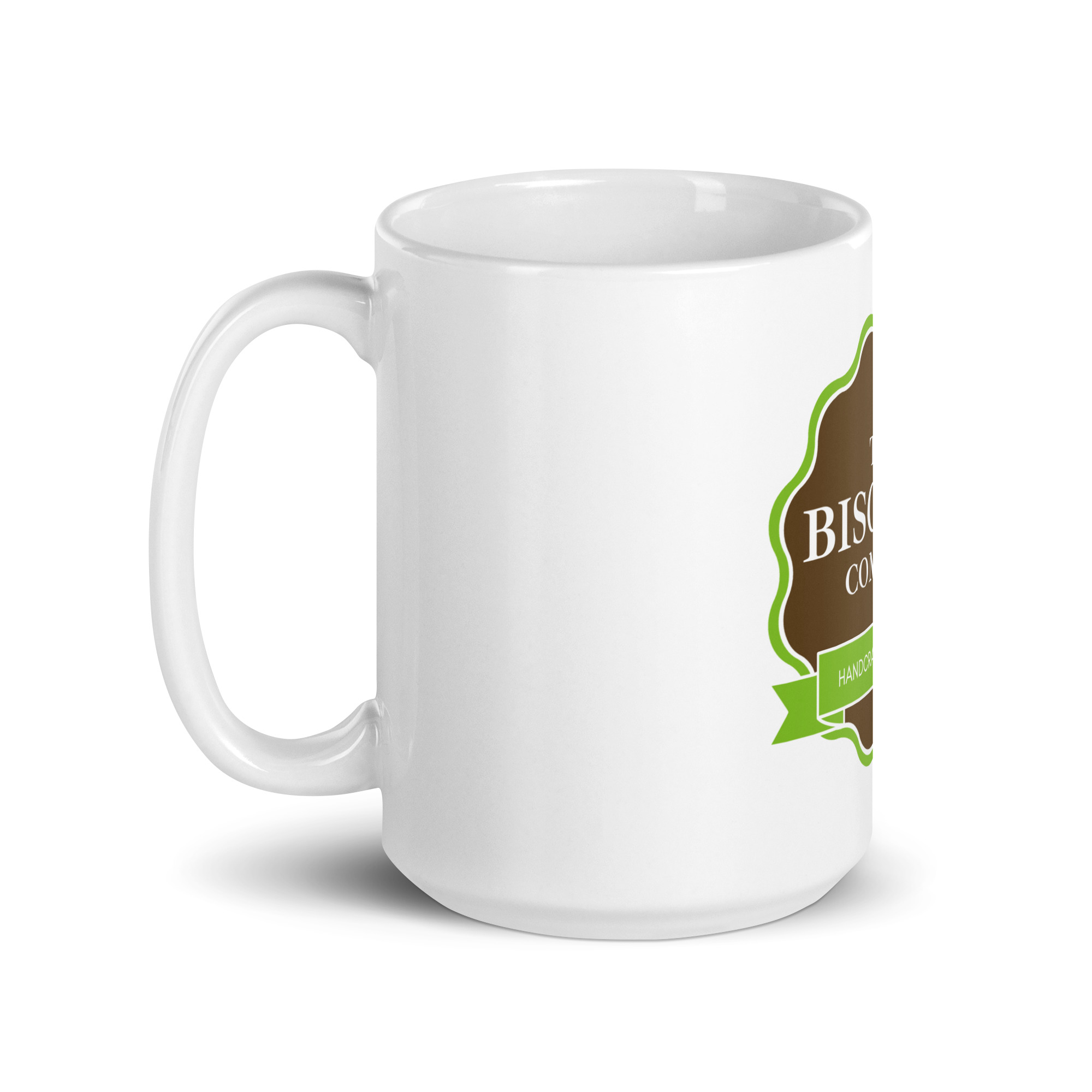 White ceramic mug with a partial brown label and green accent on the side (product shot).