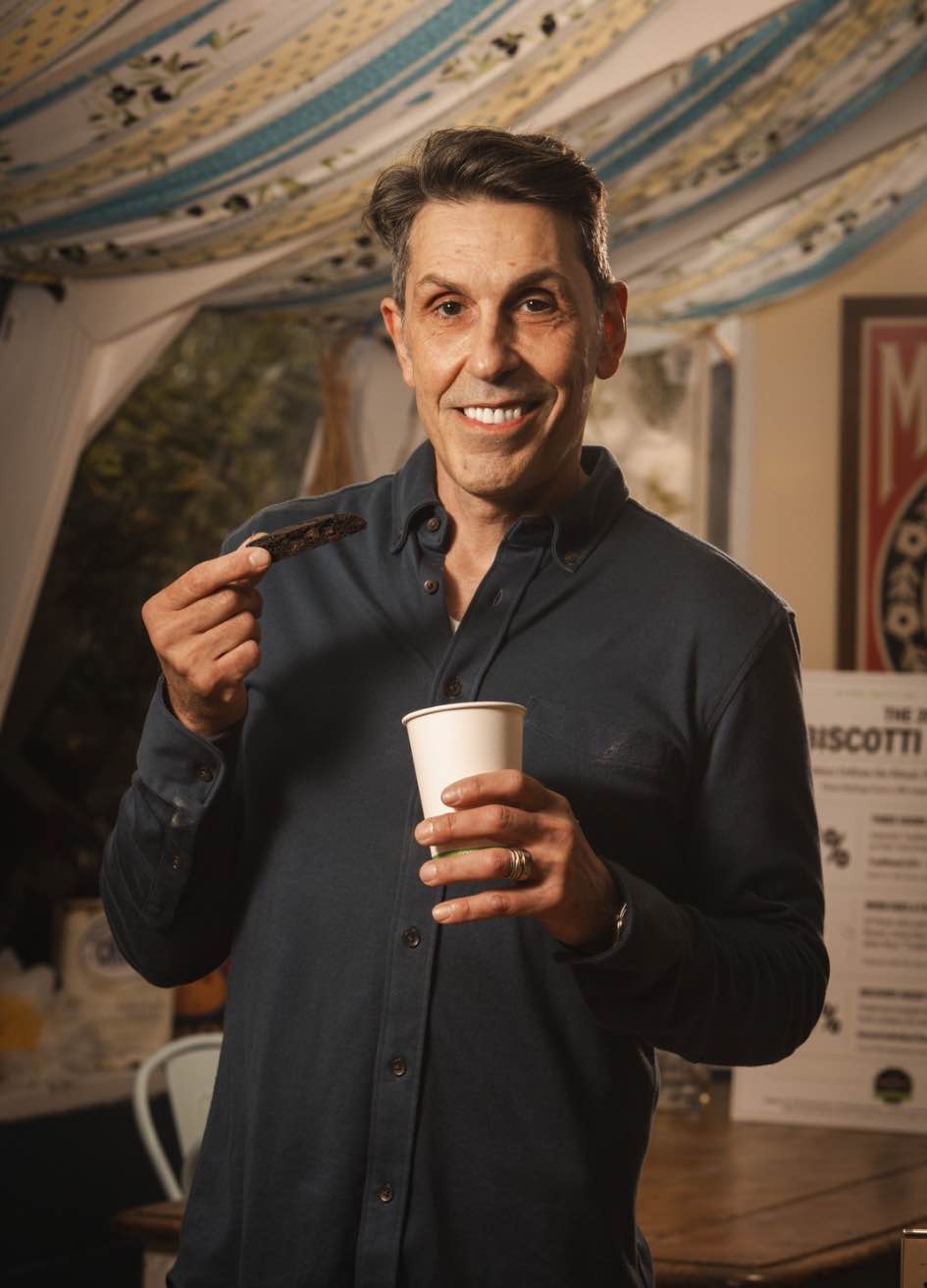 Bruno LoGreco holding coffee and Double Chocolate biscotti during The 2026 Biscotti Report tasting